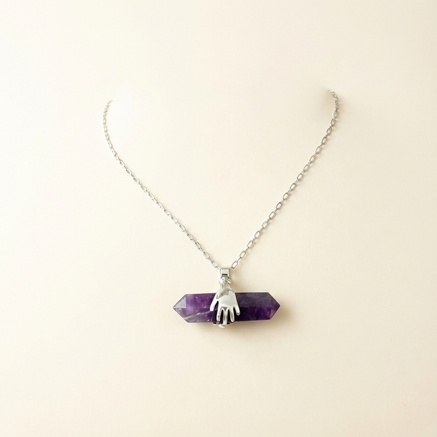 Hands Holding Chevron Amethyst – Double Point Pendant